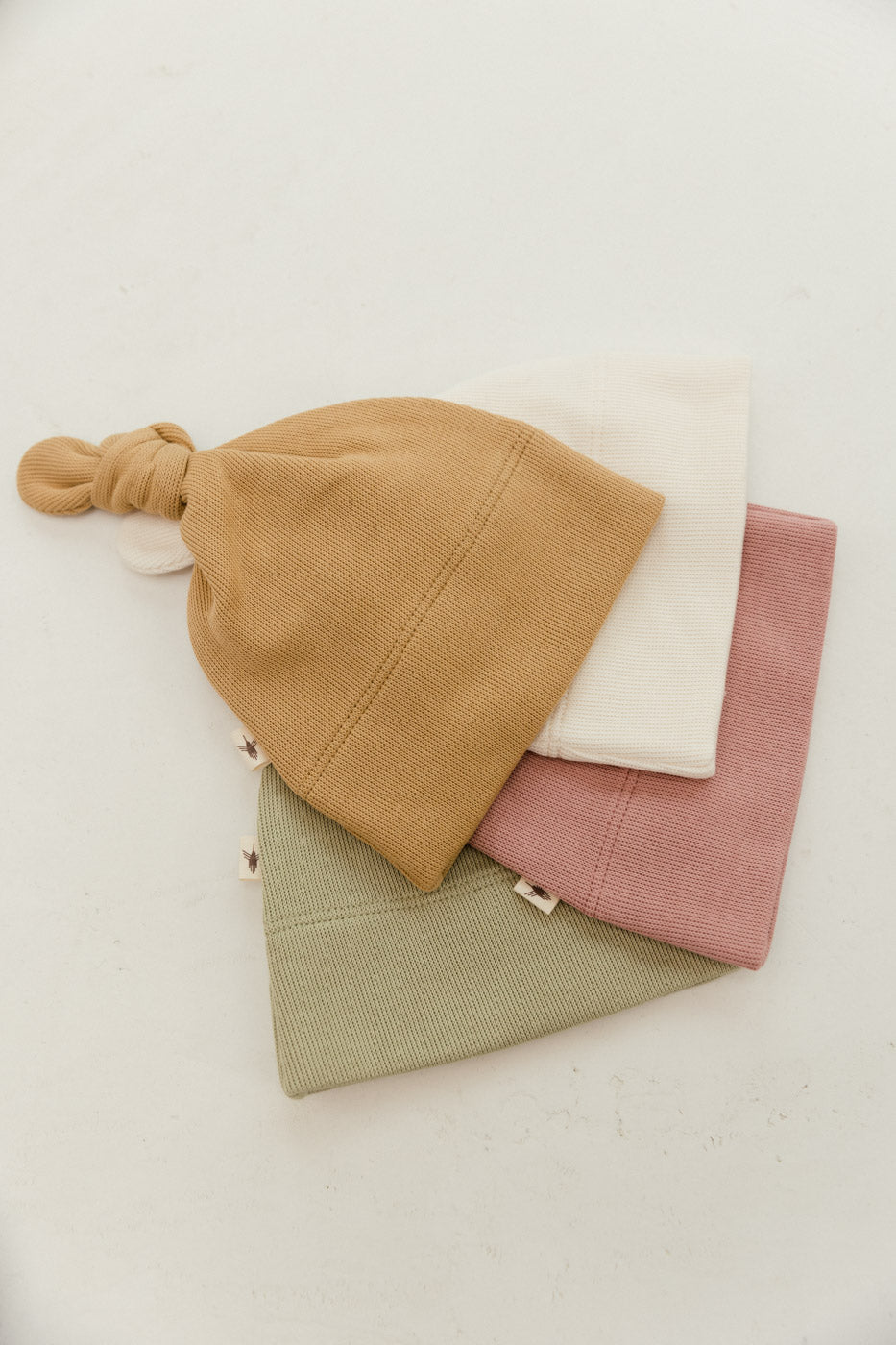 GEKNOOPTE MUTS – PERLA