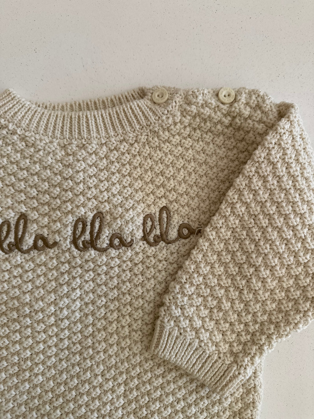 Knitted sweater bla bla bla