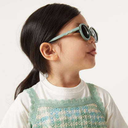 Zonnebril Kiddos Komono Lou sage 2-6 j